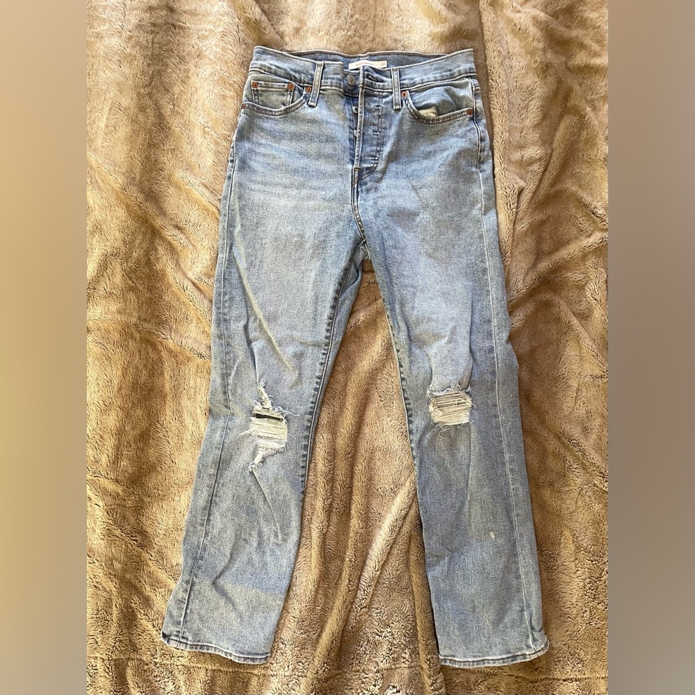 Women’s Levi’s wedgie straight blue jeans, knee rips, size waist 28 length 28.